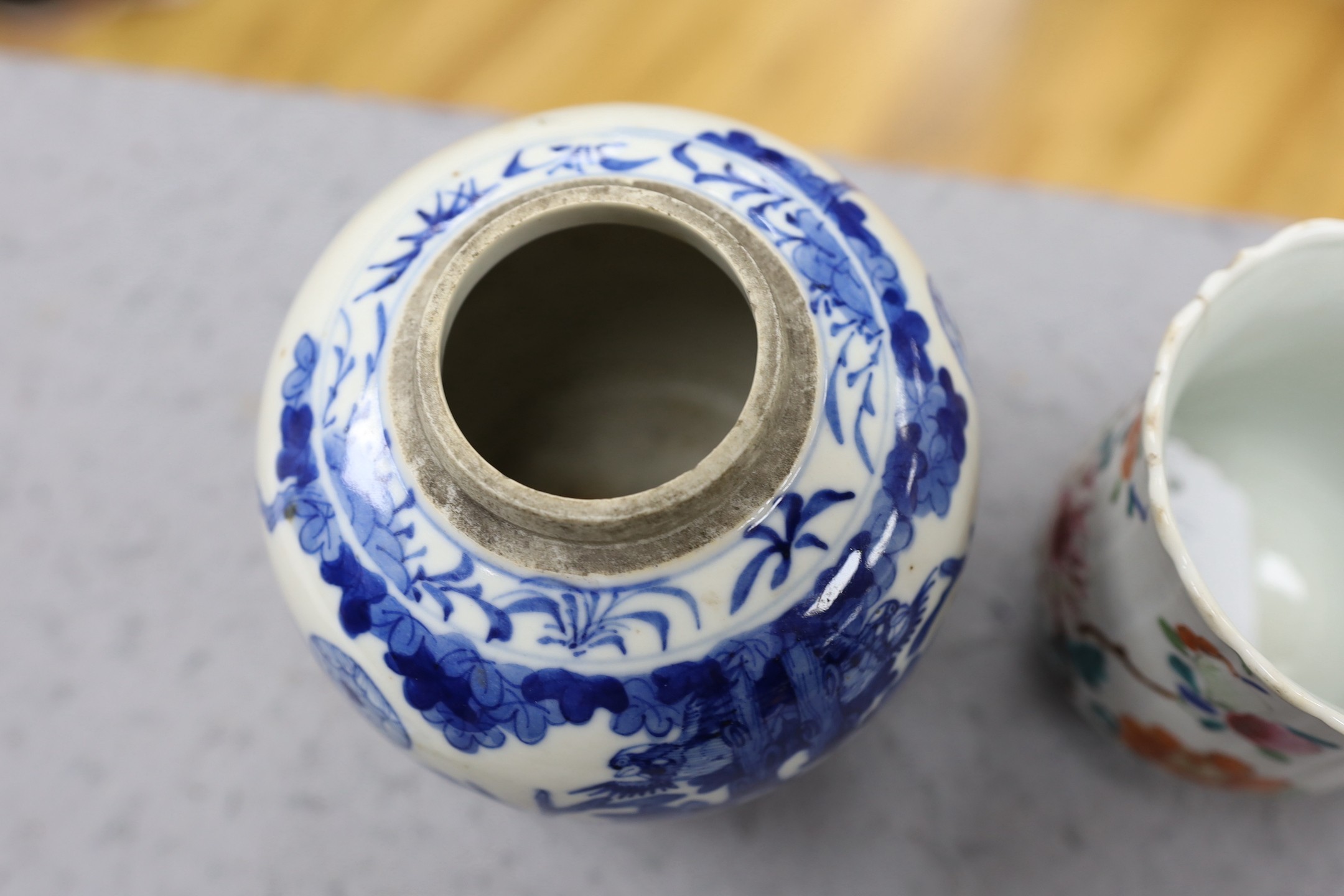 A Chinese blue and white jar and cover, Kangxi mark late 19th century and an 18th century Chinese famille rose mug. 15.5cm high